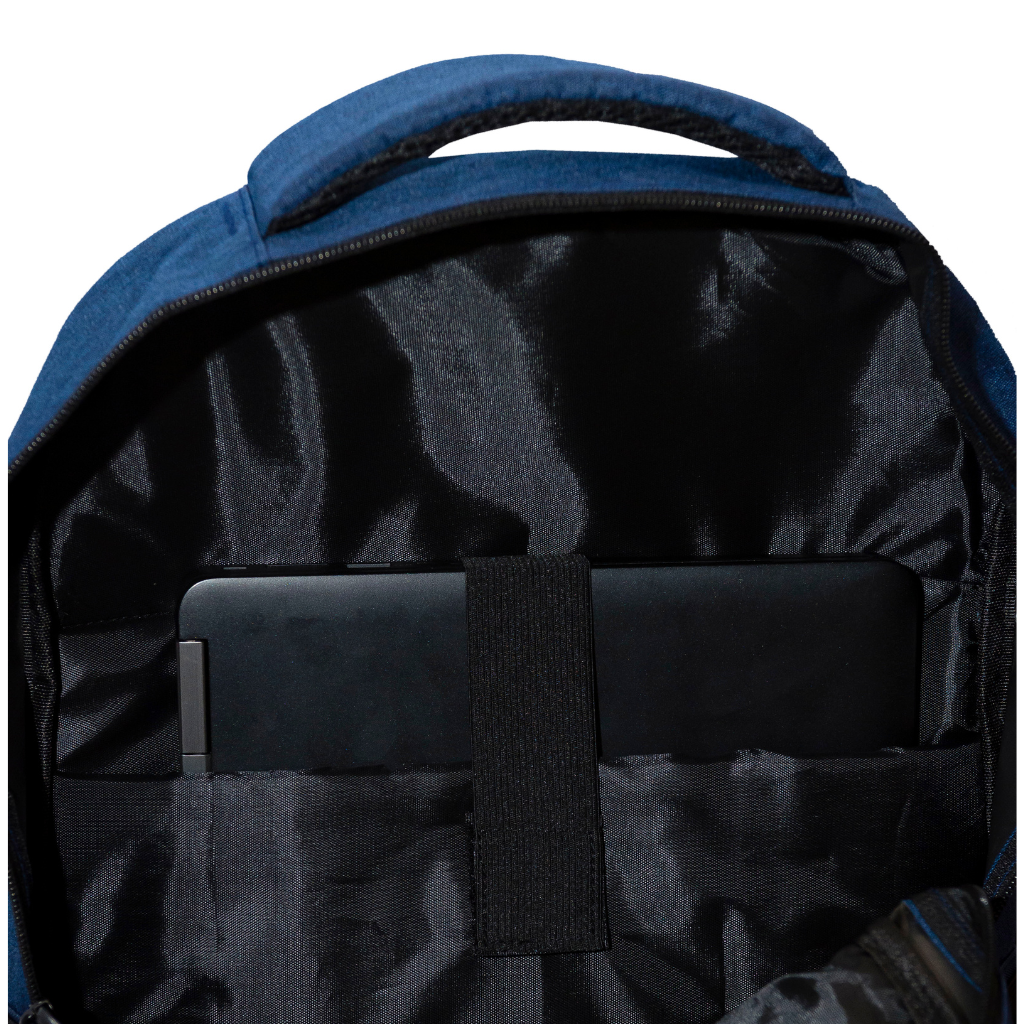 Close-up of the padded laptop compartment inside a navy blue backpack. Shows secure strap and protective design, perfect for corporate merchandise.