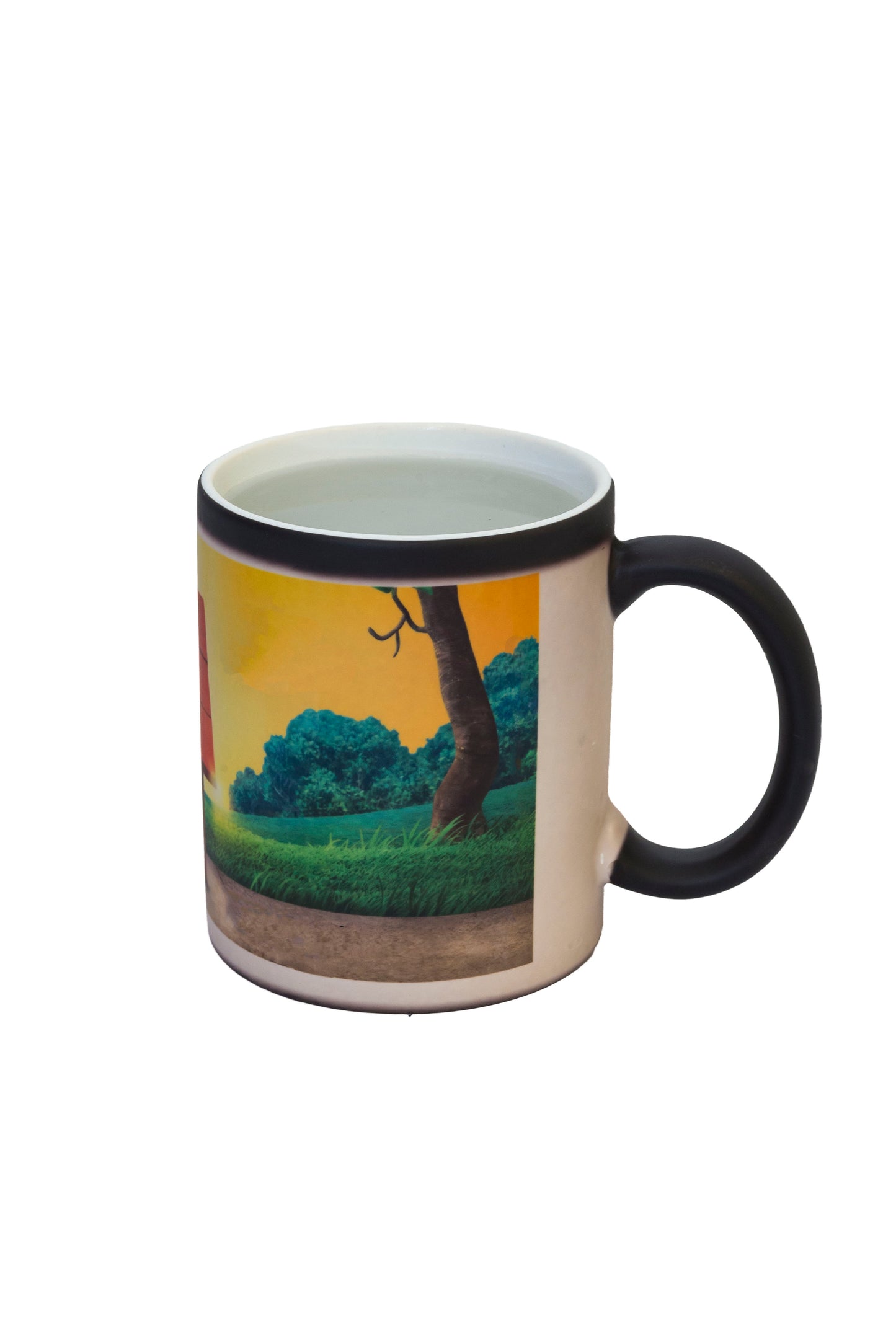 Magic mug with a hidden landscape image that appears when hot liquid is added